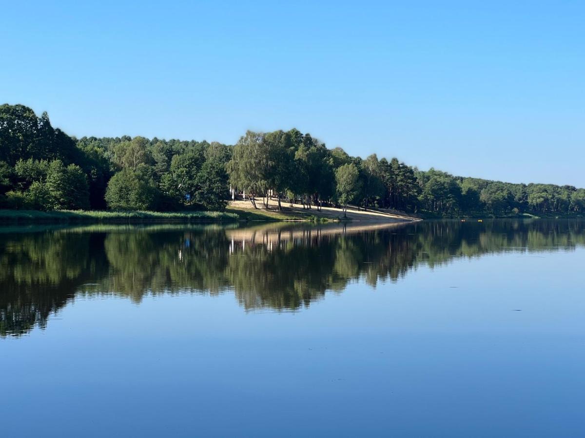 Family Sauna Retreat: Lesny Lakeside Apartment Kielce